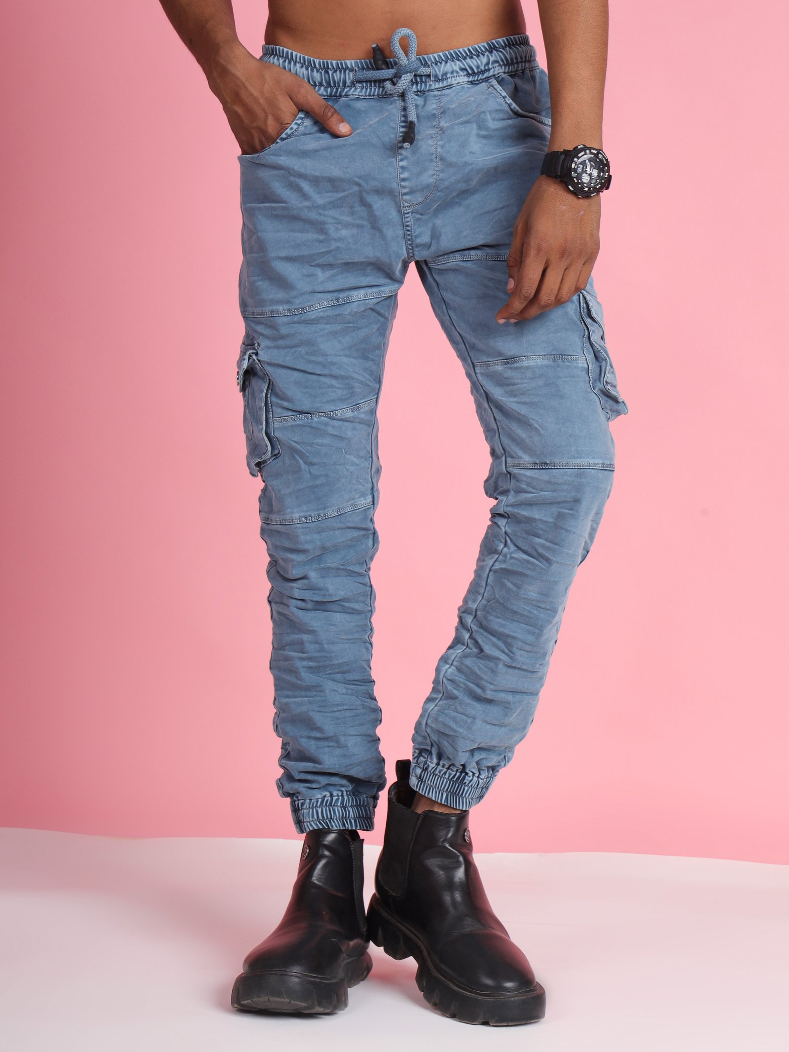 French Cliff light blue denim cargo on pink backdrop